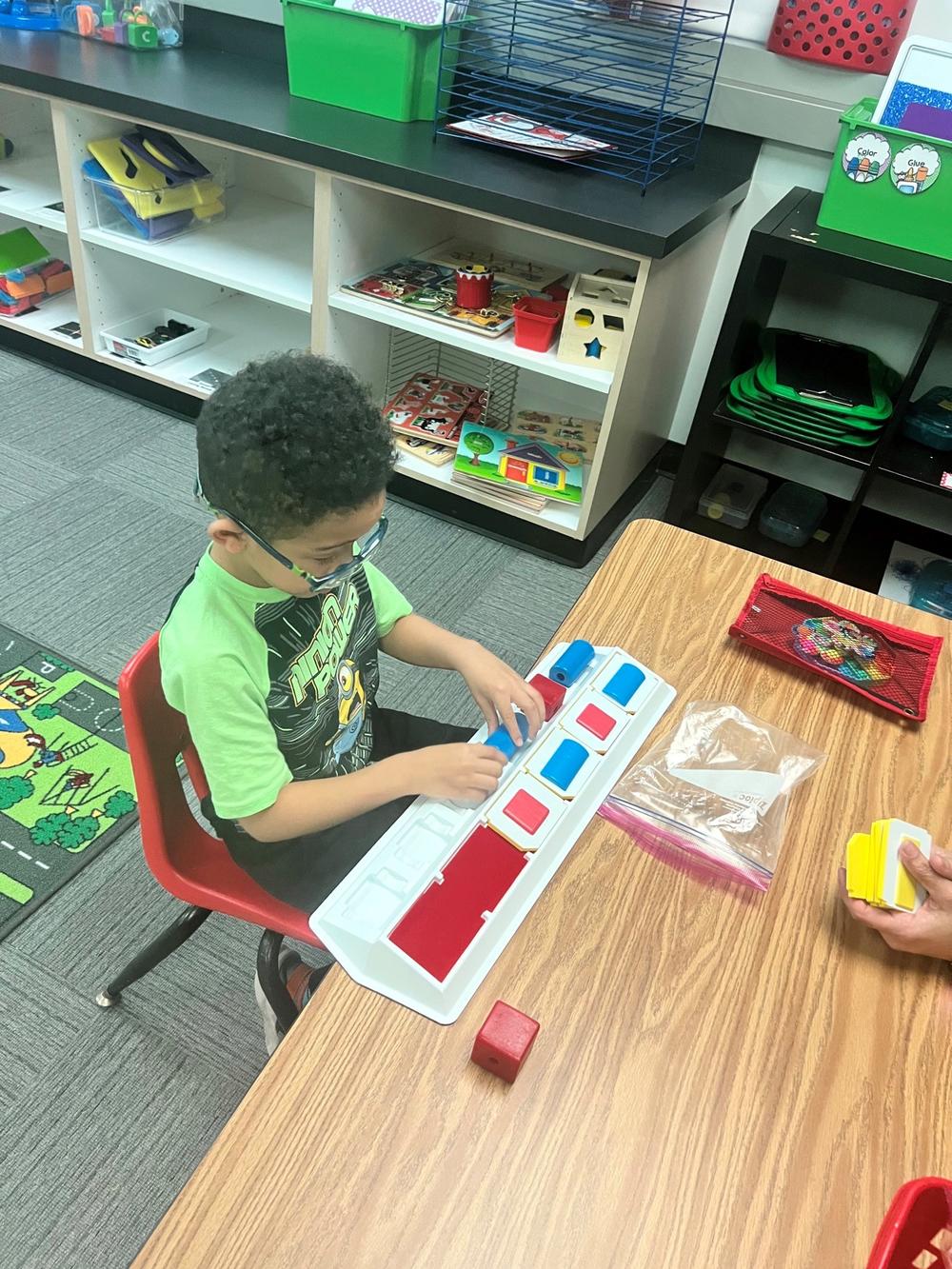 Child Working at the Toddler Class at CVI